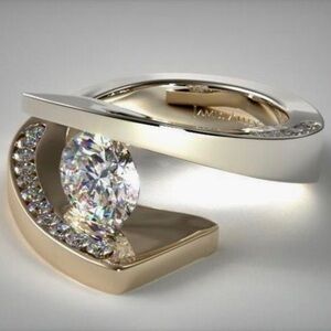 CLASSY GOLD TONE AND CZ RING.